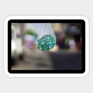 the bag of marbles Sticker